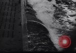 Image of German Navy submarine at a naval base Germany, 1942, second 62 stock footage video 65675035889