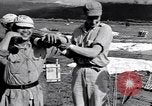 Standbild nationalistischen chinesischen Truppen unterstützt durch die Amerikaner China, 1944, aus Sekunde 58 historischem Filmmaterial Videoclip 65675035895