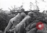 Immagine di KMT cinese di impegnare le truppe giapponesi a Teng-Chung nella provincia dello Yunnan Cina, 1944, secondo 31 filmato di repertorio 65675035897