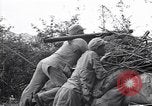 Immagine di KMT cinese di impegnare le truppe giapponesi a Teng-Chung nella provincia dello Yunnan Cina, 1944, secondo 35 filmato di repertorio 65675035897