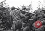Immagine di KMT cinese di impegnare le truppe giapponesi a Teng-Chung nella provincia dello Yunnan Cina, 1944, secondo 38 filmato di repertorio 65675035897