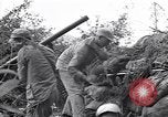 Immagine di KMT cinese di impegnare le truppe giapponesi a Teng-Chung nella provincia dello Yunnan Cina, 1944, secondo 40 filmato di repertorio 65675035897