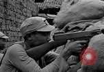 Immagine di KMT cinese di impegnare le truppe giapponesi a Teng-Chung nella provincia dello Yunnan Cina, 1944, secondo 54 filmato di repertorio 65675035897