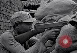 Immagine di KMT cinese di impegnare le truppe giapponesi a Teng-Chung nella provincia dello Yunnan Cina, 1944, secondo 56 filmato di repertorio 65675035897