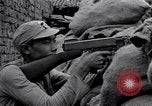 Immagine di KMT cinese di impegnare le truppe giapponesi a Teng-Chung nella provincia dello Yunnan Cina, 1944, secondo 62 filmato di repertorio 65675035897