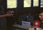 Image of currency exchange by US Army soldiers Long Binh Vietnam, 1969, second 21 stock footage video 65675035969