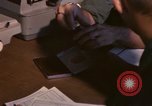 Image of currency exchange by US Army soldiers Long Binh Vietnam, 1969, second 29 stock footage video 65675035969