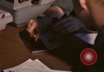 Image of currency exchange by US Army soldiers Long Binh Vietnam, 1969, second 31 stock footage video 65675035969