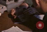 Image of currency exchange by US Army soldiers Long Binh Vietnam, 1969, second 32 stock footage video 65675035969