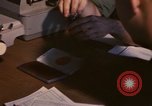 Image of currency exchange by US Army soldiers Long Binh Vietnam, 1969, second 33 stock footage video 65675035969