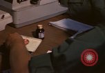 Image of currency exchange by US Army soldiers Long Binh Vietnam, 1969, second 40 stock footage video 65675035969