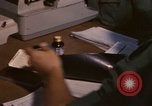 Image of currency exchange by US Army soldiers Long Binh Vietnam, 1969, second 41 stock footage video 65675035969