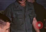 Image of currency exchange by US Army soldiers Long Binh Vietnam, 1969, second 54 stock footage video 65675035969