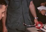 Image of currency exchange by US Army soldiers Long Binh Vietnam, 1969, second 56 stock footage video 65675035969