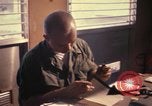 Image of currency exchange by US soldiers Long Binh Vietnam, 1969, second 14 stock footage video 65675035970