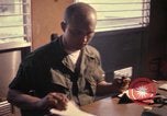 Image of currency exchange by US soldiers Long Binh Vietnam, 1969, second 15 stock footage video 65675035970