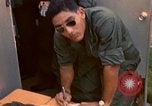Image of currency exchange by US soldiers Long Binh Vietnam, 1969, second 50 stock footage video 65675035970