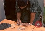 Image of currency exchange by US soldiers Long Binh Vietnam, 1969, second 53 stock footage video 65675035970