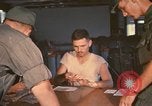 Image of currency exchange by soldiers Long Binh Vietnam, 1969, second 56 stock footage video 65675035971
