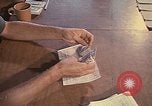 Image of currency exchange Long Binh Vietnam, 1969, second 49 stock footage video 65675035978