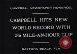 Image of Campbell driving Bluebird Daytona Beach Florida USA, 1931, second 3 stock footage video 65675035997