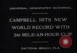 Image of Campbell driving Bluebird Daytona Beach Florida USA, 1931, second 7 stock footage video 65675035997
