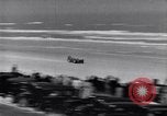 Image of Campbell driving Bluebird Daytona Beach Florida USA, 1931, second 39 stock footage video 65675035997