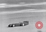 Image of Campbell driving Bluebird Daytona Beach Florida USA, 1931, second 40 stock footage video 65675035997
