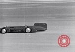 Image of Campbell driving Bluebird Daytona Beach Florida USA, 1931, second 41 stock footage video 65675035997