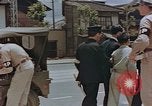 Standbild schwarz Marketing durch die Amerikaner Kyoto Japan, 1946, aus Sekunde 26 historischem Filmmaterial Videoclip 65675036007