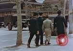 Standbild schwarz Marketing durch die Amerikaner Kyoto Japan, 1946, aus Sekunde 29 historischem Filmmaterial Videoclip 65675036007