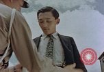 Standbild schwarz Marketing durch die Amerikaner Kyoto Japan, 1946, aus Sekunde 35 historischem Filmmaterial Videoclip 65675036007