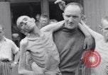 Immagine di Campo di concentramento i superstiti Ebensee Austria, 1945, secondo 32 filmato di repertorio 65675036066