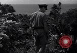 Image of Coast Watcher and a Police man Bougainville Island Papua New Guinea, 1943, second 38 stock footage video 65675036172