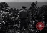 Image of Coast Watcher and a Police man Bougainville Island Papua New Guinea, 1943, second 40 stock footage video 65675036172
