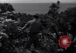 Image of Coast Watcher and a Police man Bougainville Island Papua New Guinea, 1943, second 41 stock footage video 65675036172