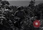 Image of Coast Watcher and a Police man Bougainville Island Papua New Guinea, 1943, second 55 stock footage video 65675036172