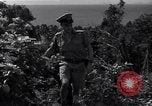 Image of Coast Watcher and a Police man Bougainville Island Papua New Guinea, 1943, second 56 stock footage video 65675036172
