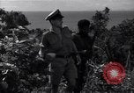 Image of Coast Watcher and a Police man Bougainville Island Papua New Guinea, 1943, second 57 stock footage video 65675036172