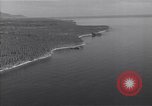 Image of coast line and forests Guadalcanal Solomon Islands, 1943, second 25 stock footage video 65675036177