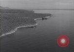Image of coast line and forests Guadalcanal Solomon Islands, 1943, second 28 stock footage video 65675036177