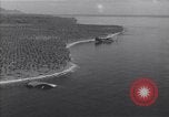 Image of coast line and forests Guadalcanal Solomon Islands, 1943, second 34 stock footage video 65675036177