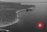 Image of coast line and forests Guadalcanal Solomon Islands, 1943, second 36 stock footage video 65675036177