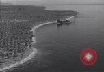 Image of coast line and forests Guadalcanal Solomon Islands, 1943, second 37 stock footage video 65675036177