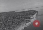 Image of coast line and forests Guadalcanal Solomon Islands, 1943, second 46 stock footage video 65675036177