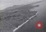 Image of coast line and forests Guadalcanal Solomon Islands, 1943, second 53 stock footage video 65675036177