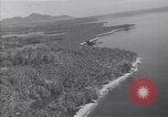 Image of coast line and forests Guadalcanal Solomon Islands, 1943, second 57 stock footage video 65675036177