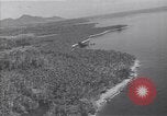 Image of coast line and forests Guadalcanal Solomon Islands, 1943, second 58 stock footage video 65675036177