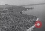 Image of coast line and forests Guadalcanal Solomon Islands, 1943, second 59 stock footage video 65675036177