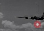 Image of B-29 bomber landing Saipan Northern Mariana Islands, 1944, second 10 stock footage video 65675036186